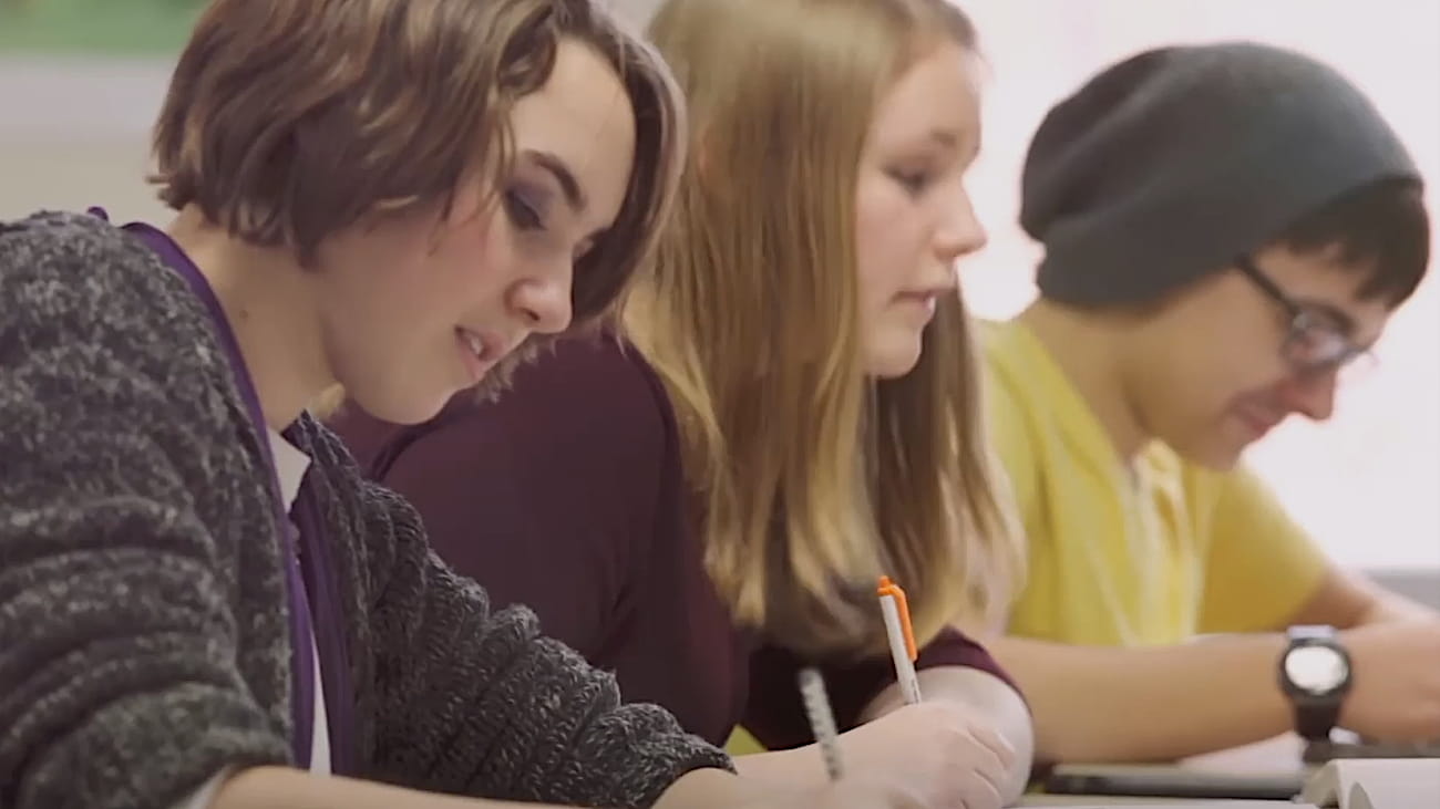 Students take notes.