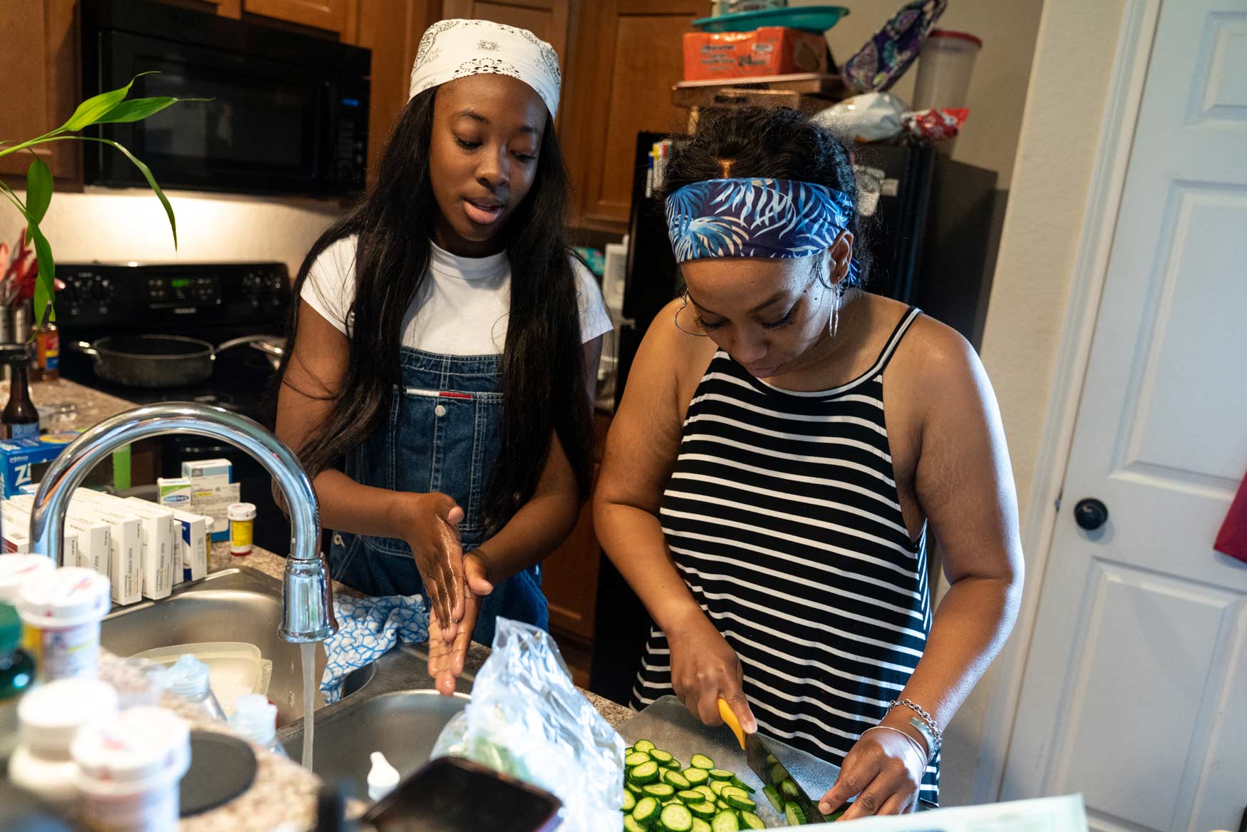 Dana Jones cares for her daughters, Kami and Kyra, who have sickle cell disease.