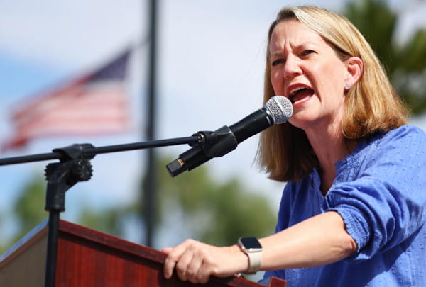 Kris Mayes, Arizona's Attorney General, speaks at a Women's March rally in Phoenix, AZ.