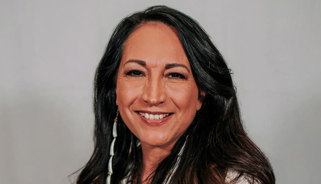 Professional headshot of Crystal Echo Hawk, founder and Executive Director of IllumiNative, and a Pivotal Ventures partner.