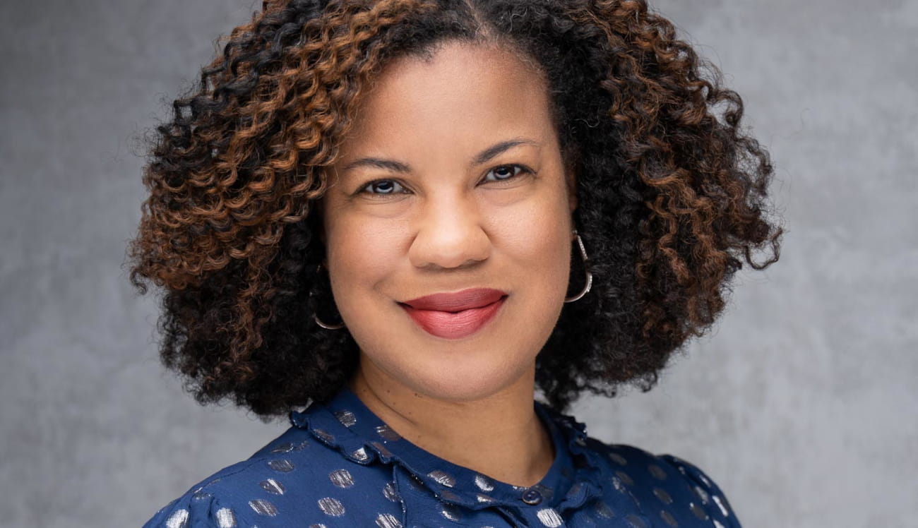 Professional headshot of Dwana Franklin-Davis, the CEO of Reboot Representation, and a Pivotal Ventures partner.