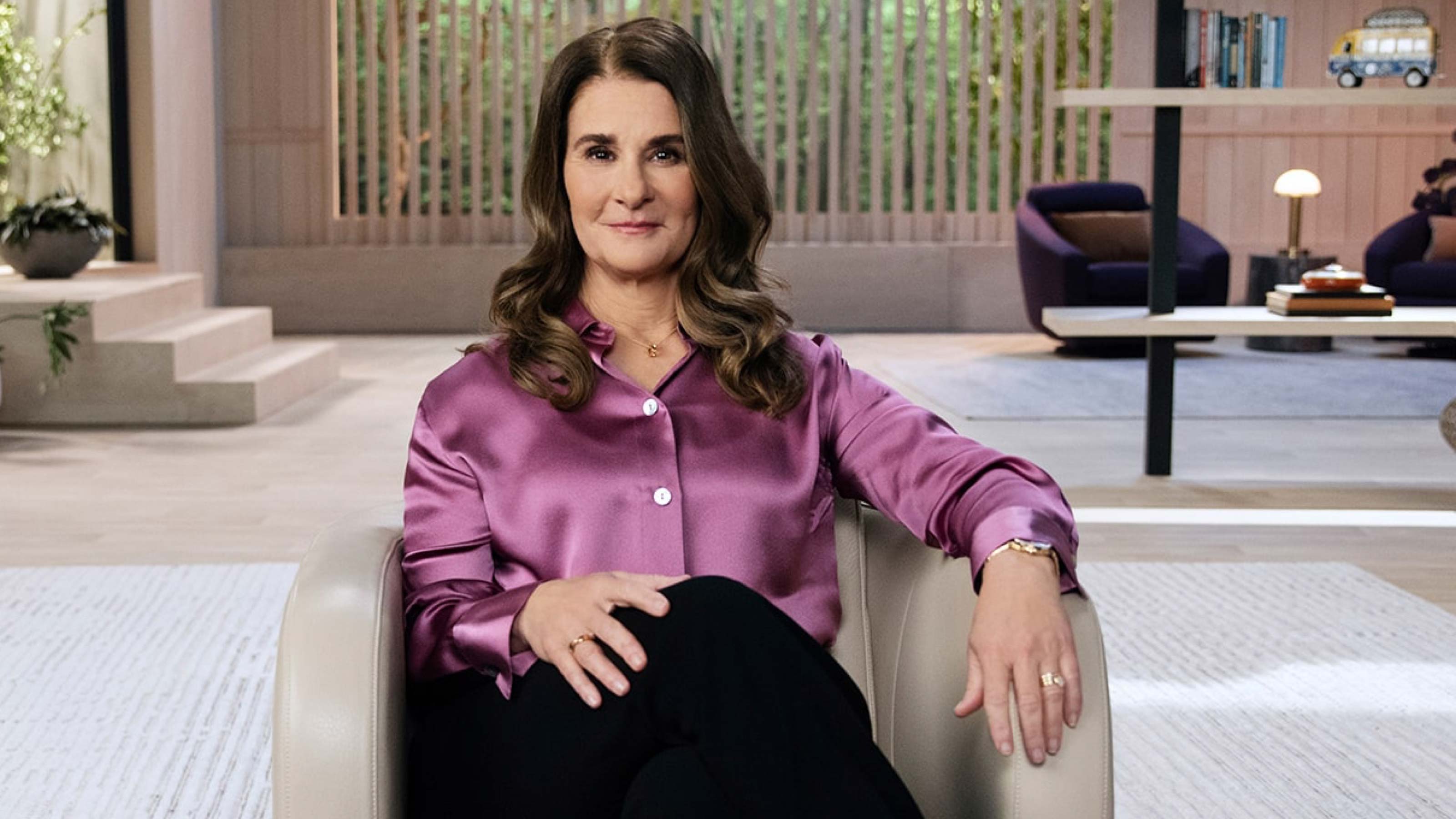 Melinda French Gates sits in a contemporary office and looks into the camera.