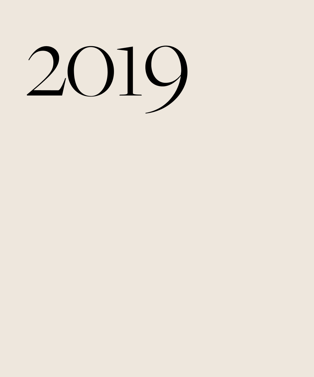Black text on a beige background, 2019